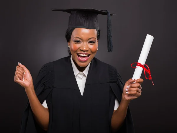 University student holding her graduation certificate — Stock Photo, Image