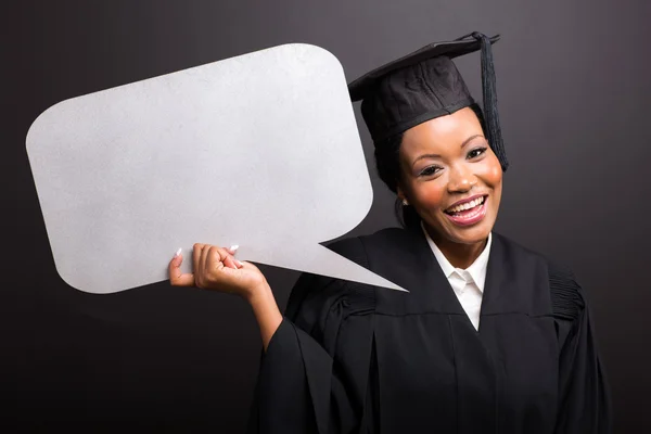 Jovem graduado com bolha de texto em branco — Fotografia de Stock