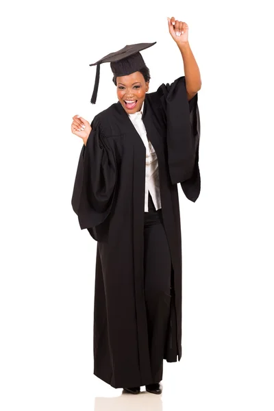 Young female university graduate dancing — Stock Photo, Image