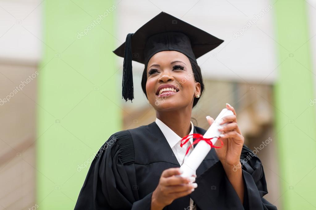 College student in graduation cap and gown