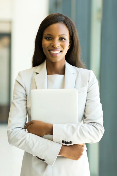 Office worker holding laptop computer — Stock Photo, Image