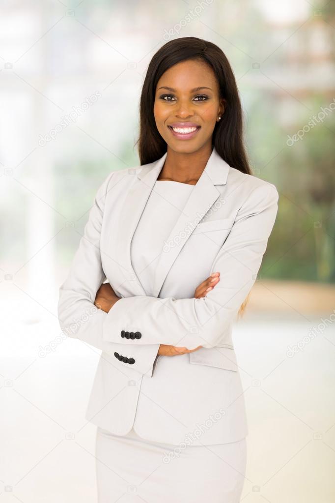 Businesswoman with arms crossed in office