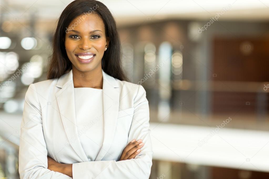 Black business executive with arms crossed Stock Photo by ©michaeljung
