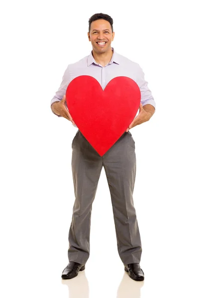 Hombre sosteniendo el corazón rojo — Foto de Stock