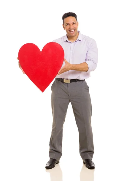 Man presenting heart symbol — Stock Photo, Image