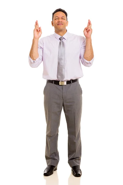 Hombre de mediana edad con los dedos cruzados — Foto de Stock