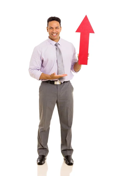 Hombre mostrando símbolo de flecha — Foto de Stock