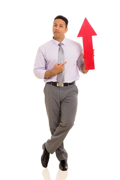 Бізнесмен, який вказує символ червоної стрілки — стокове фото