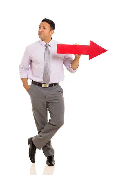 Man with red direction arrow — Stock Photo, Image