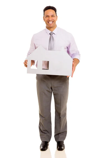 Businessman holding paper house — Stock Photo, Image