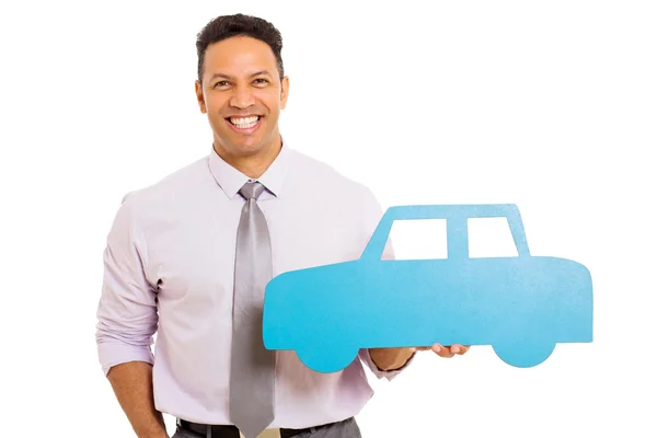 Empresário mostrando carro de papel azul — Fotografia de Stock