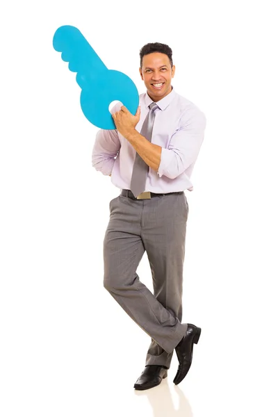 Man holding key symbol — Stock Photo, Image
