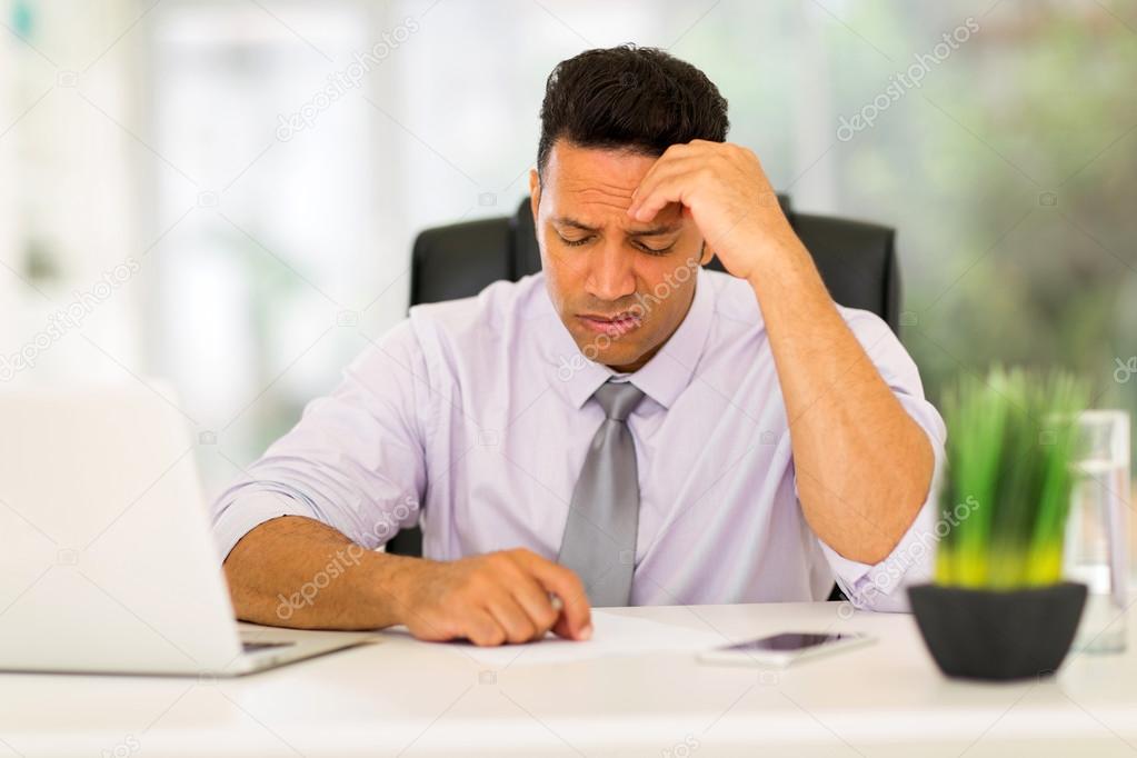 businessman having headache at work