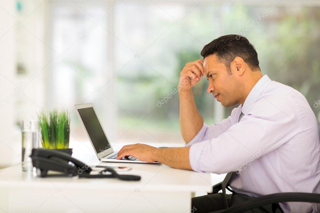 Businessman looking at computer screen