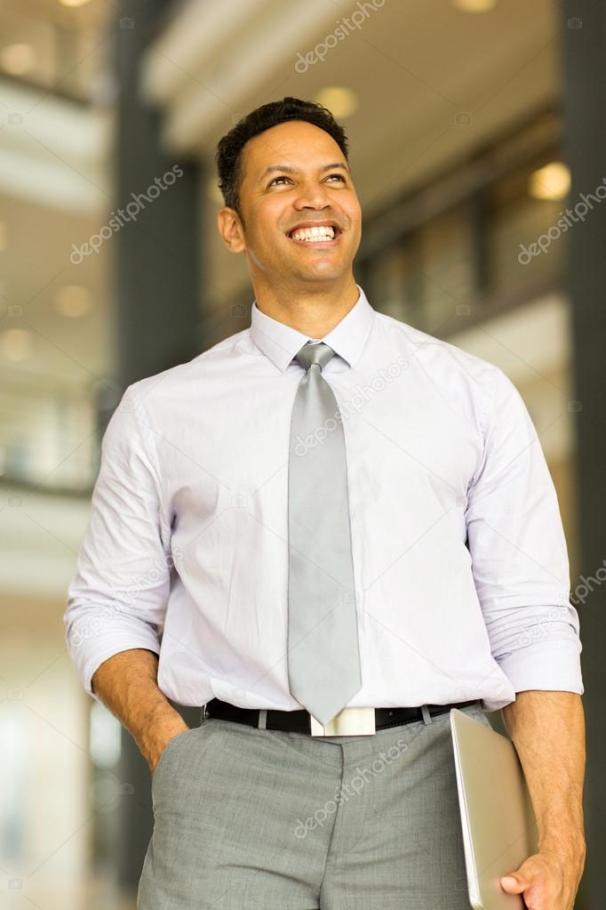 business man standing in modern office