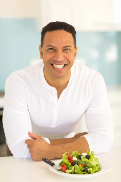 Man with green salad — Stock Photo, Image