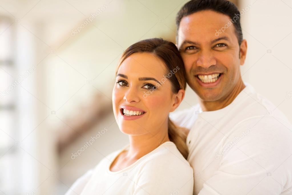 mid age couple looking at the camera