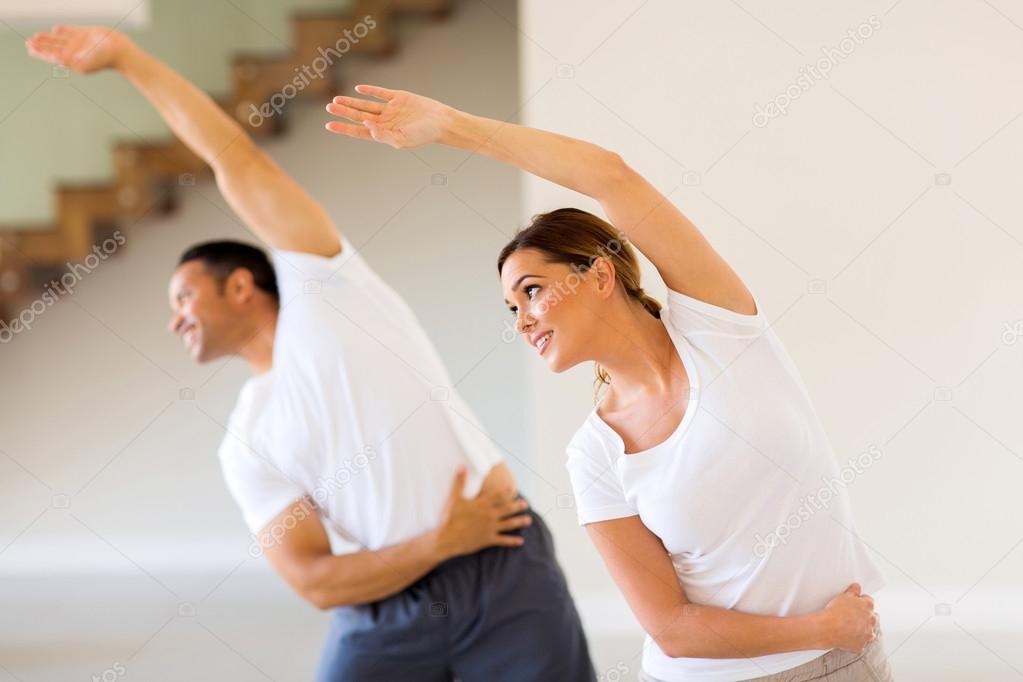 woman exercising with husband