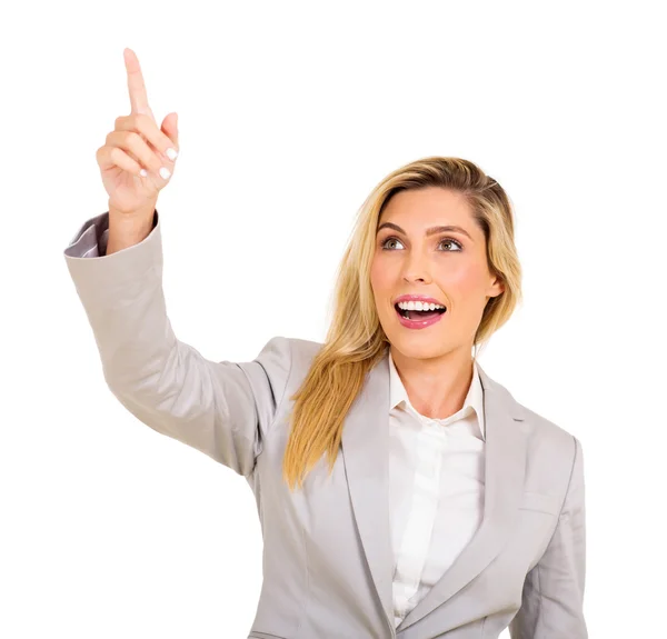 Mujer de negocios alegre señalando hacia arriba — Foto de Stock