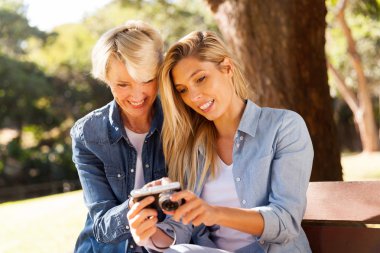 mother viewing photos