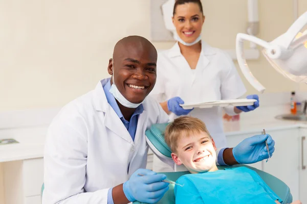 Medical team and young patient — Stok fotoğraf