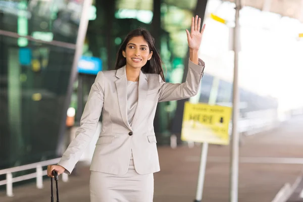 Indian businesswoman hailing for a taxi — Stock Photo, Image