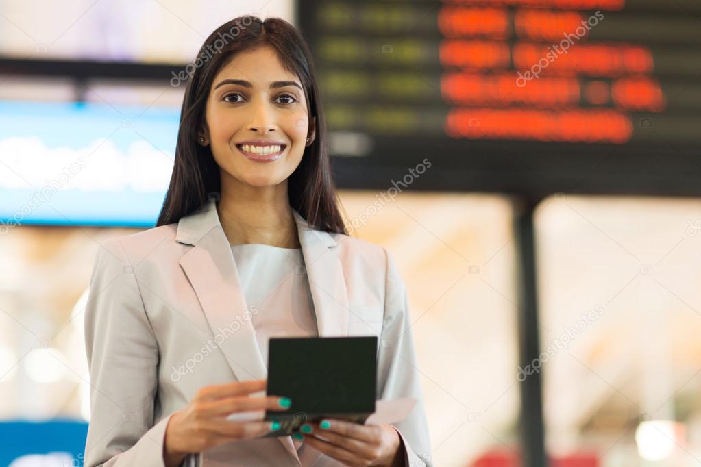 businesswoman holding passport