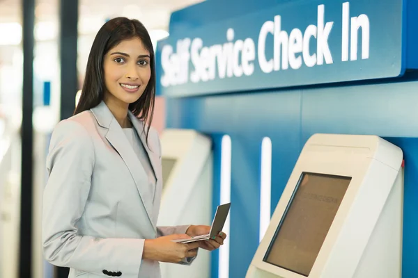 Indian businesswoman using machine — Stock Photo, Image