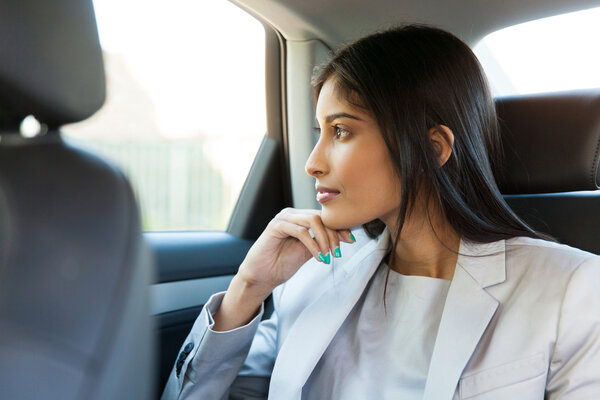 woman sitting in car