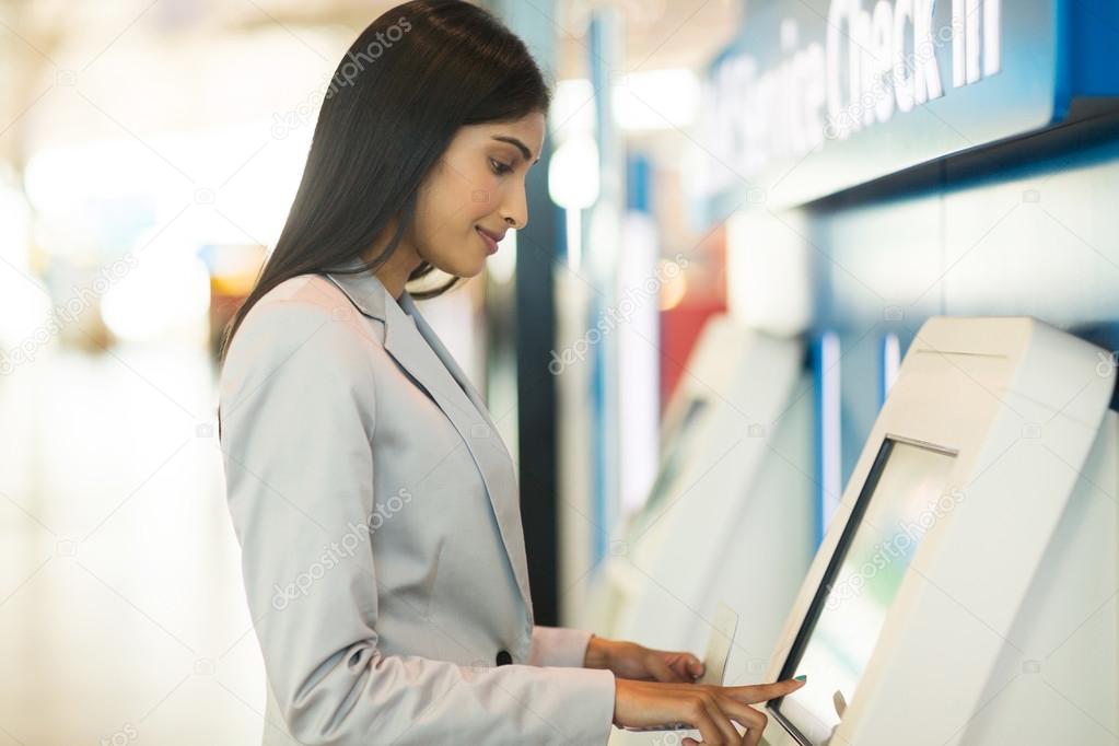 traveller using self service check in