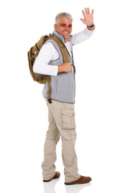 üst düzey turist sallayarak veda 