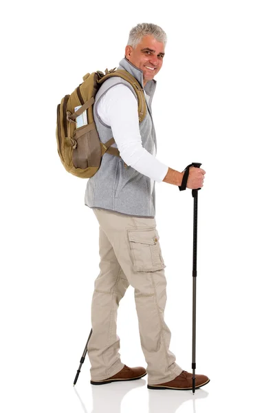 Man with backpack and hiking poles — Stock Photo, Image