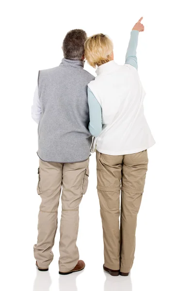 Couple pointing at empty space — Stock Photo, Image