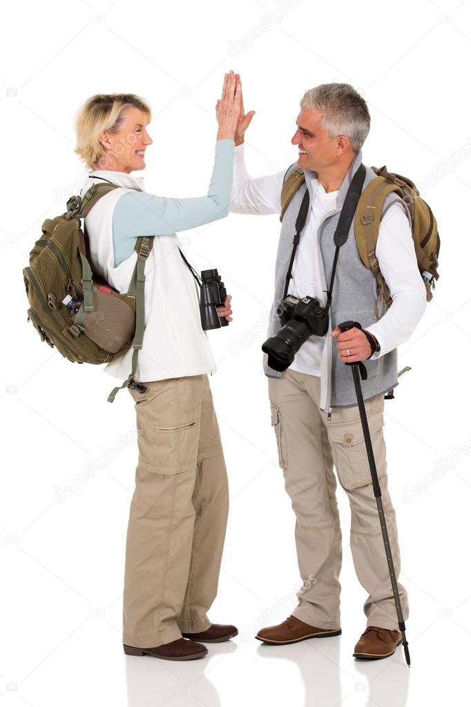 hiking couple giving high five
