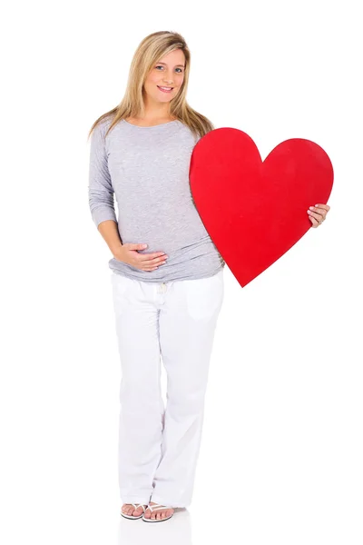 Žena držící symbol srdce — Stock fotografie