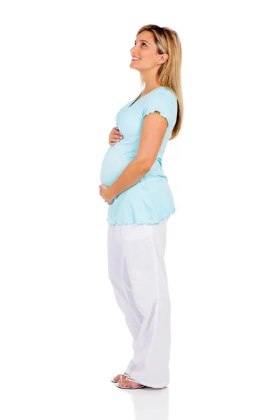 Mulher grávida com as mãos no estômago — Fotografia de Stock