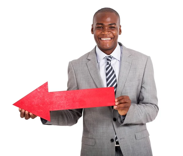 Businessman with direction arrow sign — Stock Photo, Image