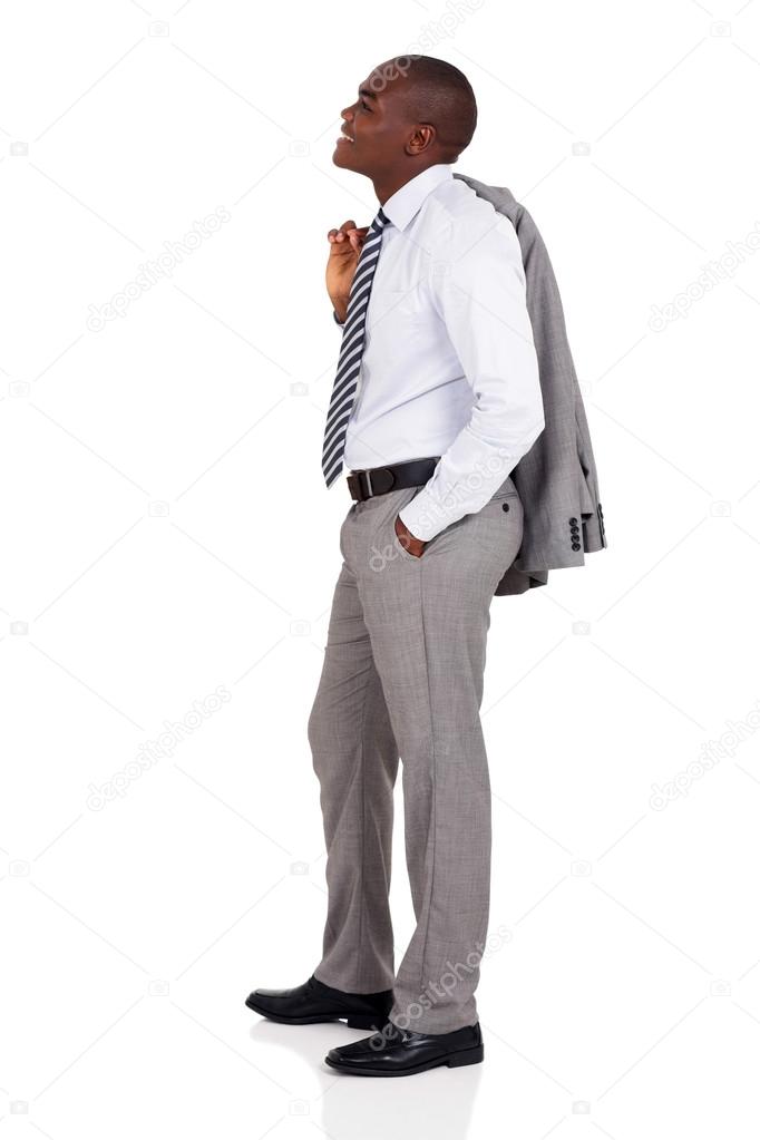businessman holding coat over shoulder