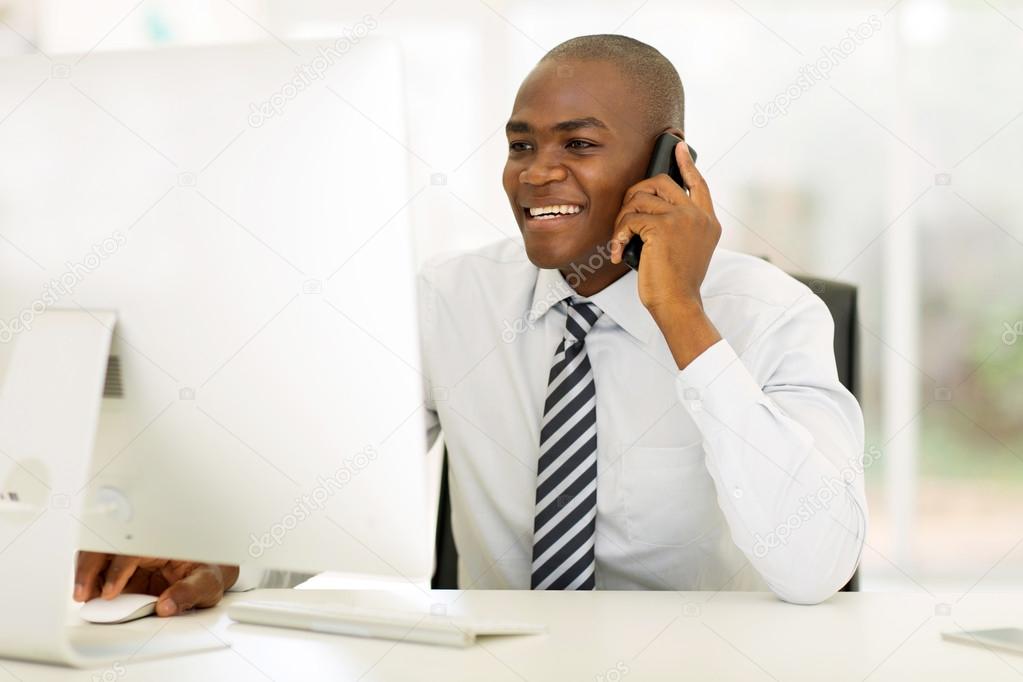 business man talking on landline phone