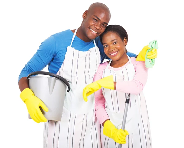 Couple holding cleaning tools — Stock Photo, Image