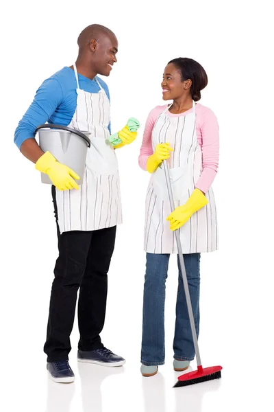 Couple holding cleaning tools — Stock Photo, Image