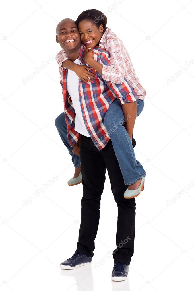 woman piggybacking on boyfriend