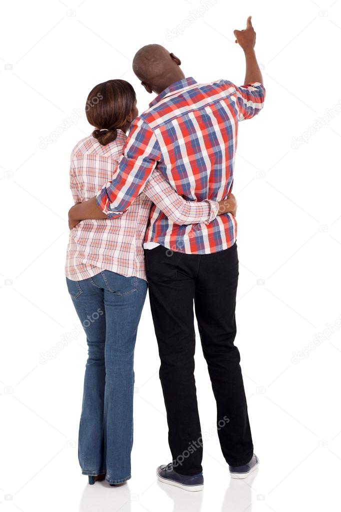 african couple pointing