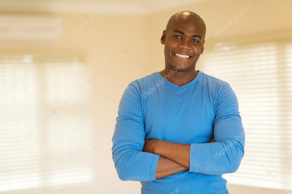 african american man with arms crossed