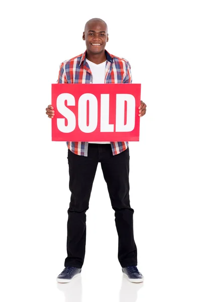 Człowiek posiadający sprzedawane znak — Zdjęcie stockowe