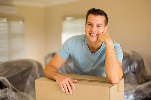 Man with moving box — Stock Photo, Image