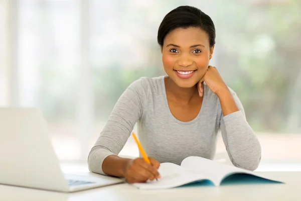 College student studying at home Stock Photo