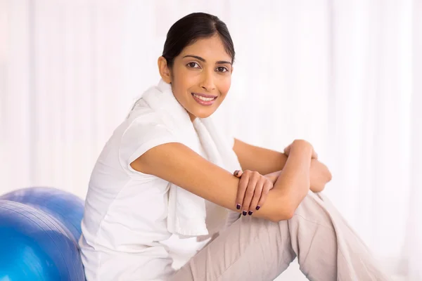 Woman relaxing after exercise at home — Stock Photo, Image