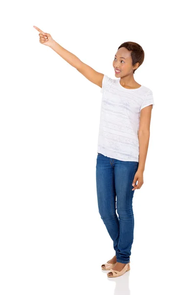 African woman pointing at empty space — Stock Photo, Image