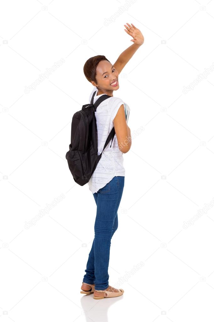 student waving goodbye